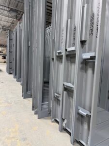 Custom metal door frames in fabrication shop