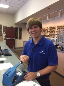 Thomas Didier Operating Pro-Lok Blue Punch Key Machine in Anderson Lock Showroom