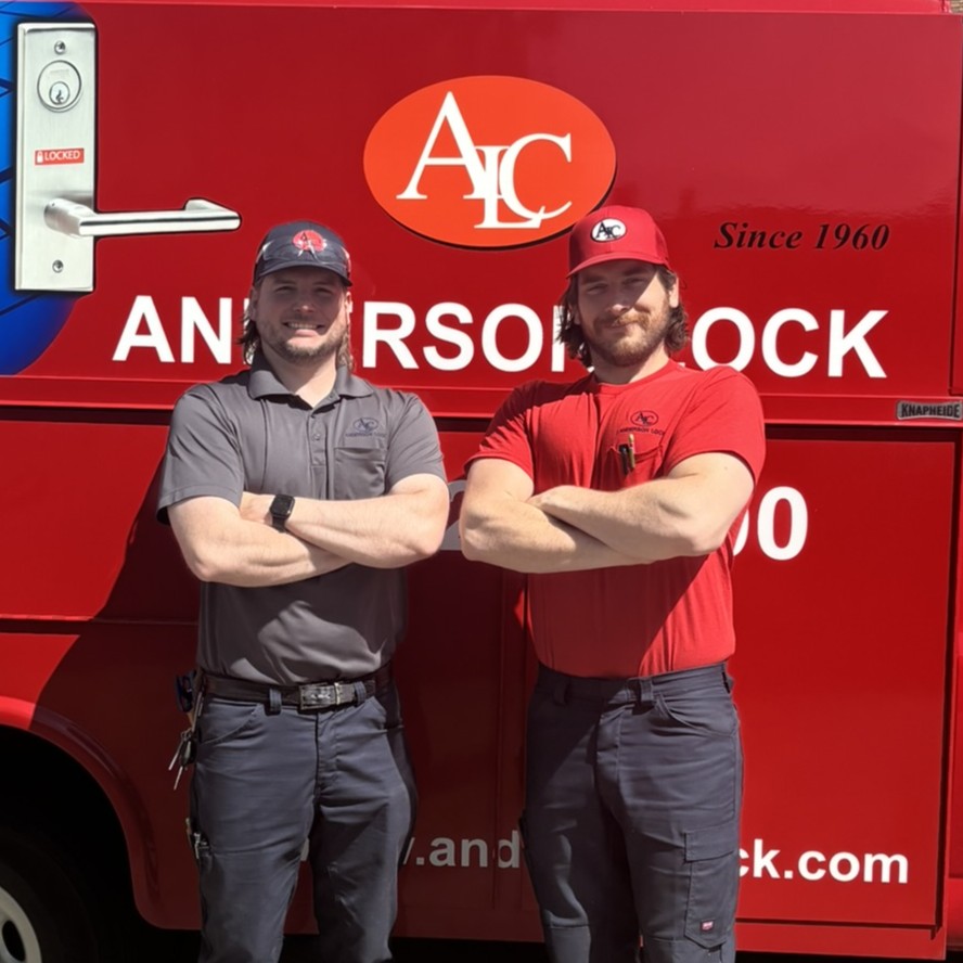Certified fire door inspector examining door hardware