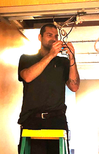 Anderson Lock Employee installing security locks